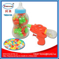Brinquedo de criança de arma de garrafa de plástico com doces
